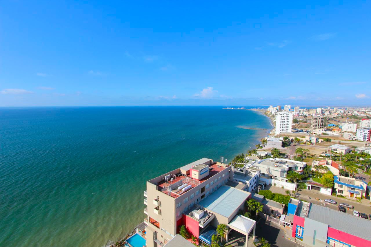 Aerial view of Poseidon Resort and Manta's Pacific coastline